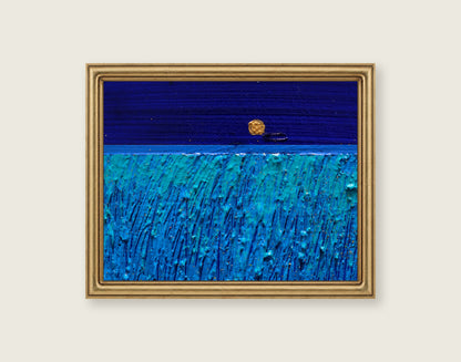 Moon Glow framed in an antique brass frame for styling context
